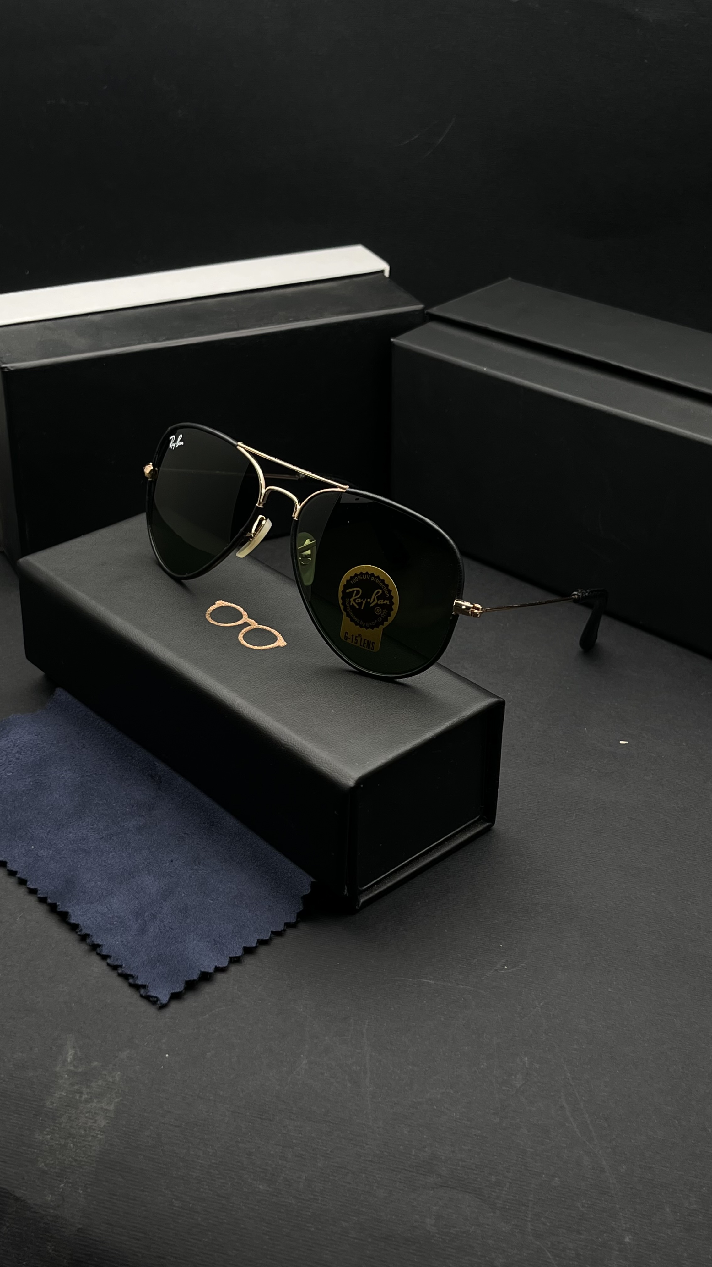 عینک افتابی ریبن شیشه سنگ دور چرم لنز uv400قیمت:۹۸۰ت